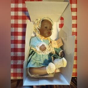 Vintage Porcelain Doll in Floral Dress